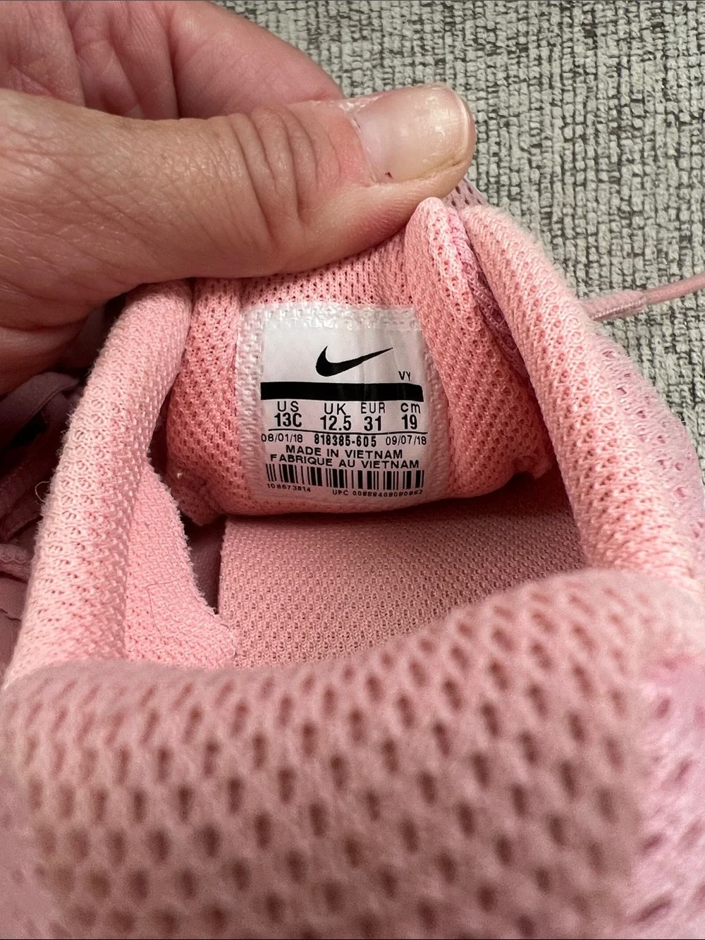 Nike Kids Pink Mesh Athletic Sneakers with White Swoosh
